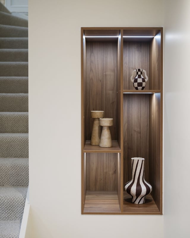 Built-in timber display niche with sculptural ceramics